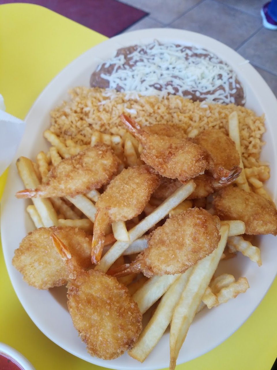 Restaurant menu laid out with kids meals and specials.