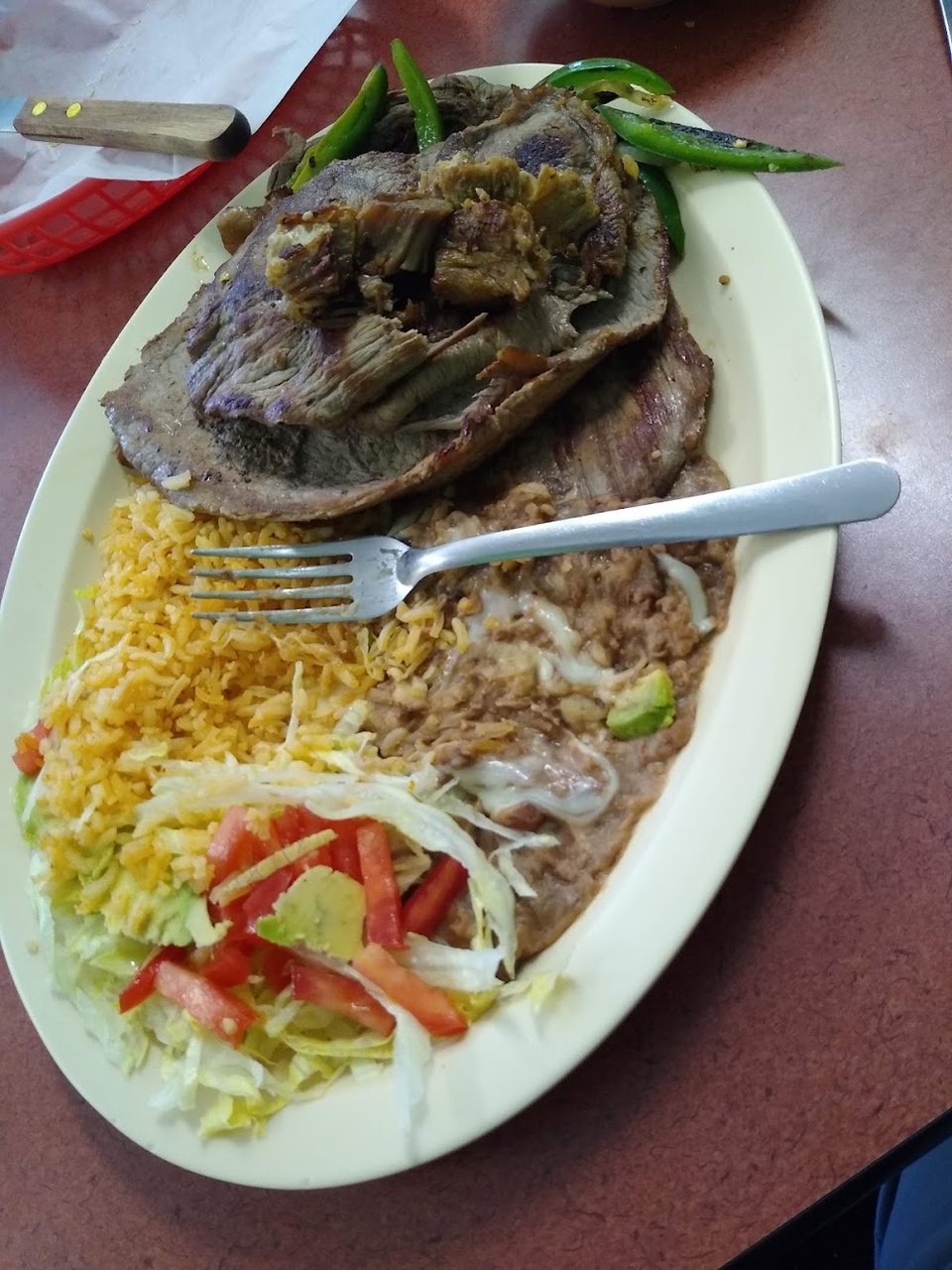 Restaurant menu laid out with kids meals and specials.